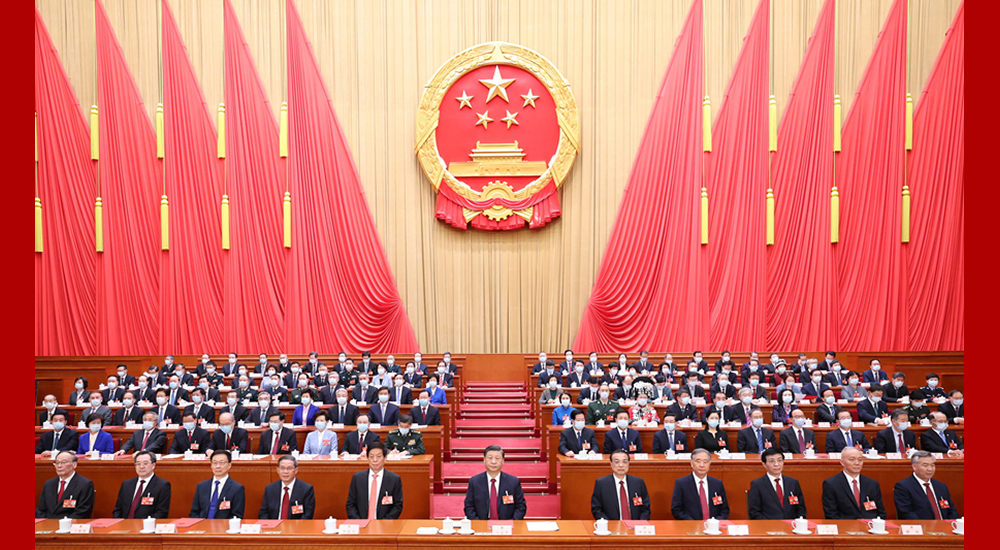 3月13日，第十四屆全國人民代表大會第一次會議在北京人民大會堂閉幕。習(xí)近平等黨和國家領(lǐng)導(dǎo)人在主席臺就座。