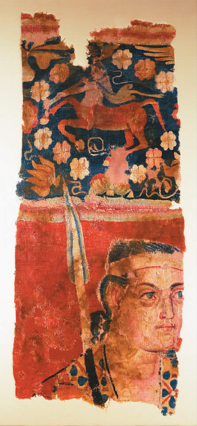 漢代藍(lán)地人首馬身紋緙毛布。 　　中國(guó)國(guó)家博物館供圖