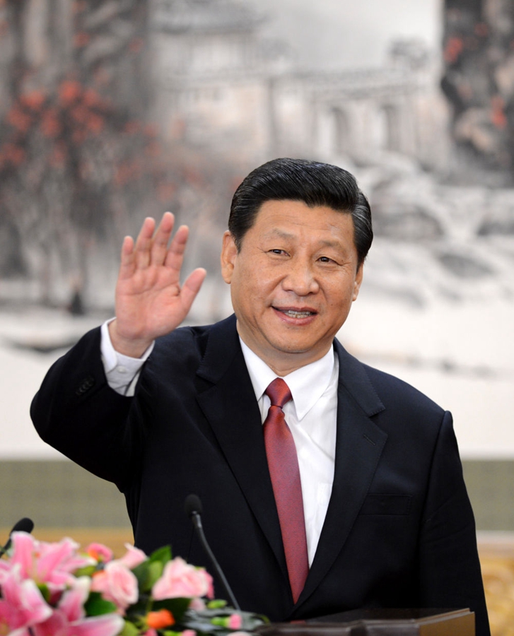 2012年11月15日，剛剛在中共十八屆一中全會(huì)上當(dāng)選中共中央總書(shū)記的習(xí)近平在北京人民大會(huì)堂同采訪十八大的中外記者親切見(jiàn)面。新華社記者 謝環(huán)馳 攝