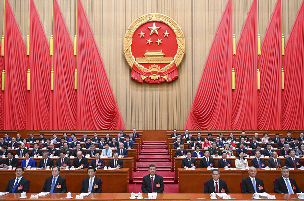 3月5日，第十四屆全國人民代表大會第二次會議在北京人民大會堂開幕。黨和國家領(lǐng)導(dǎo)人習(xí)近平、李強(qiáng)、王滬寧、蔡奇、丁薛祥、李希、韓正等出席大會。新華社記者 李學(xué)仁 攝