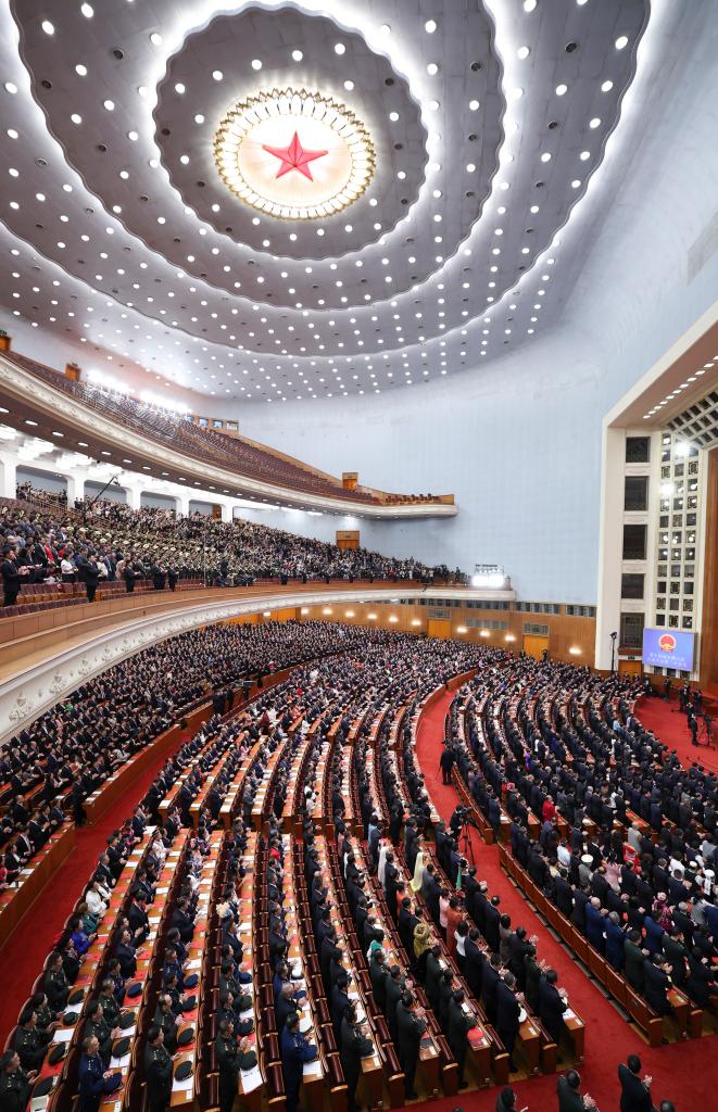 3月11日，第十四屆全國人民代表大會第二次會議在北京人民大會堂舉行閉幕會。新華社記者 丁林 攝