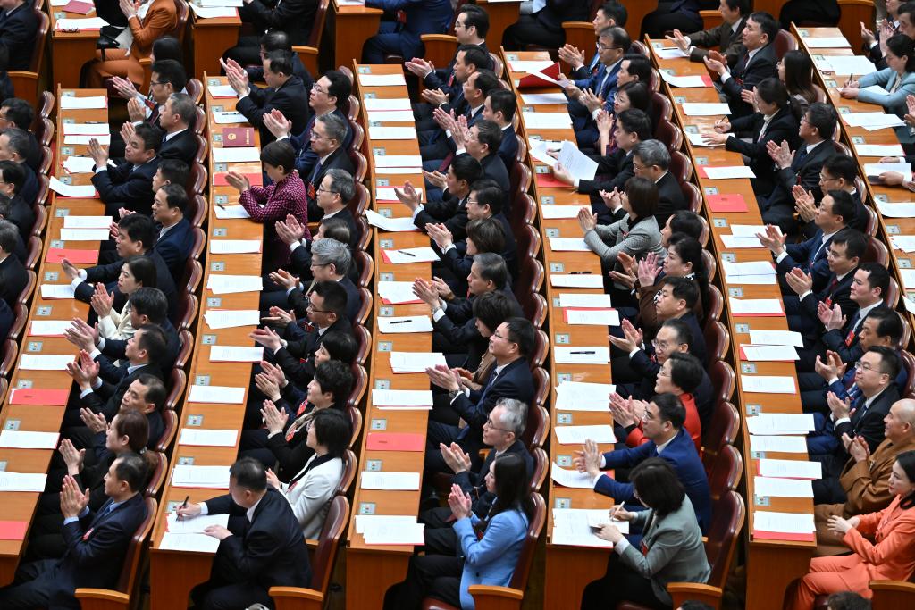 3月11日，第十四屆全國人民代表大會第二次會議在北京人民大會堂舉行閉幕會。新華社記者 李鑫 攝