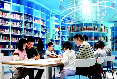 寧波少年兒童圖書館內(nèi)親子共讀。寧波市委宣傳部提供